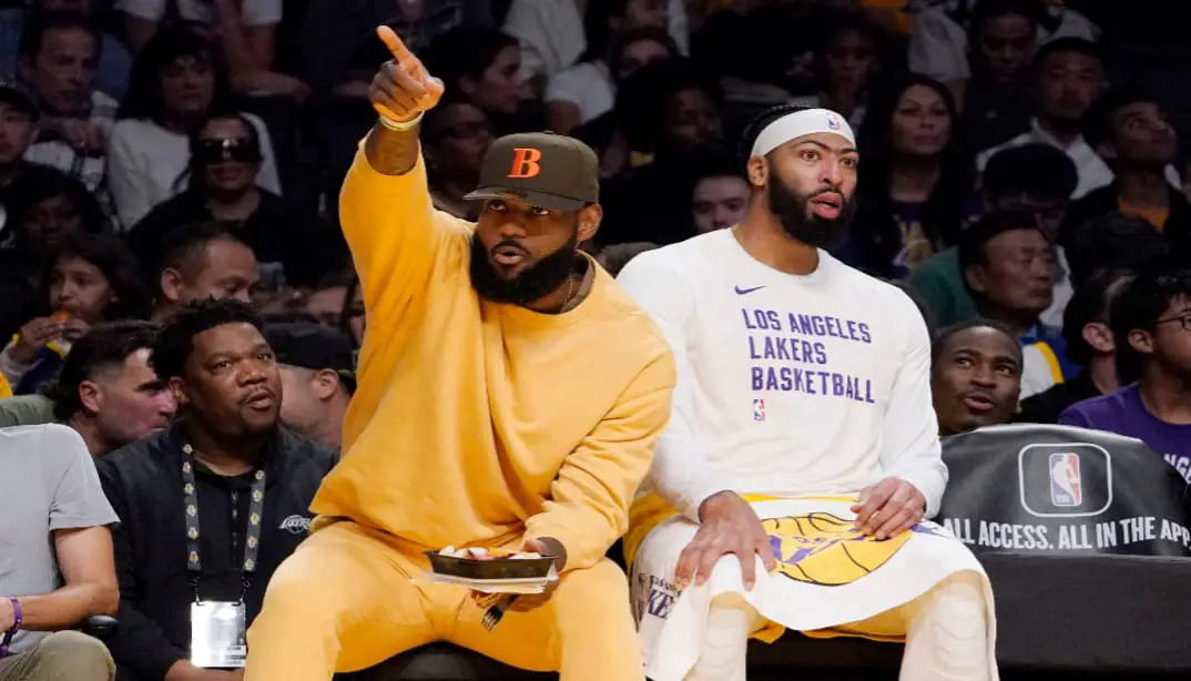 LeBron James watching a Lakers game from the sideline