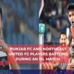 Punjab FC vs NorthEast United FC players battling during an ISL match.