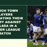 Ipswich Town players celebrating their victory against Chelsea in a Premier League match.