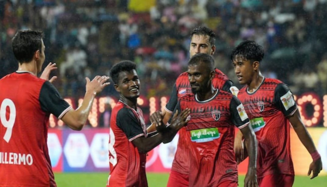 Odisha vs NorthEast United: NorthEast United FC team huddle before kickoff.