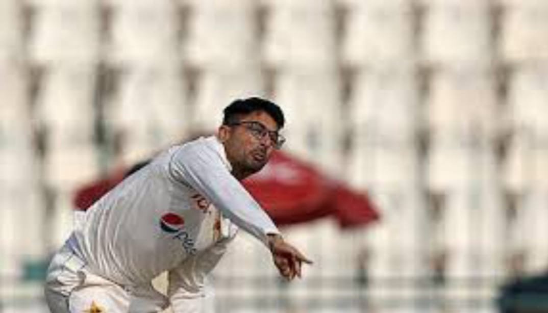 A young Abrar Ahmed practicing leg-spin bowling in a training session.