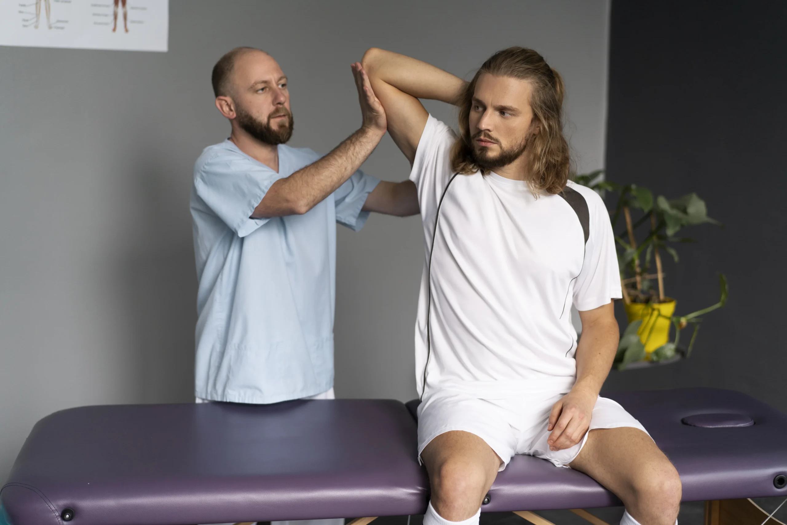 Sports Chiropractor Doctor helping patient