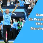 Pep Guardiola holding Premier League trophy in a jubilant celebration